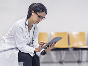 doctor using tablet